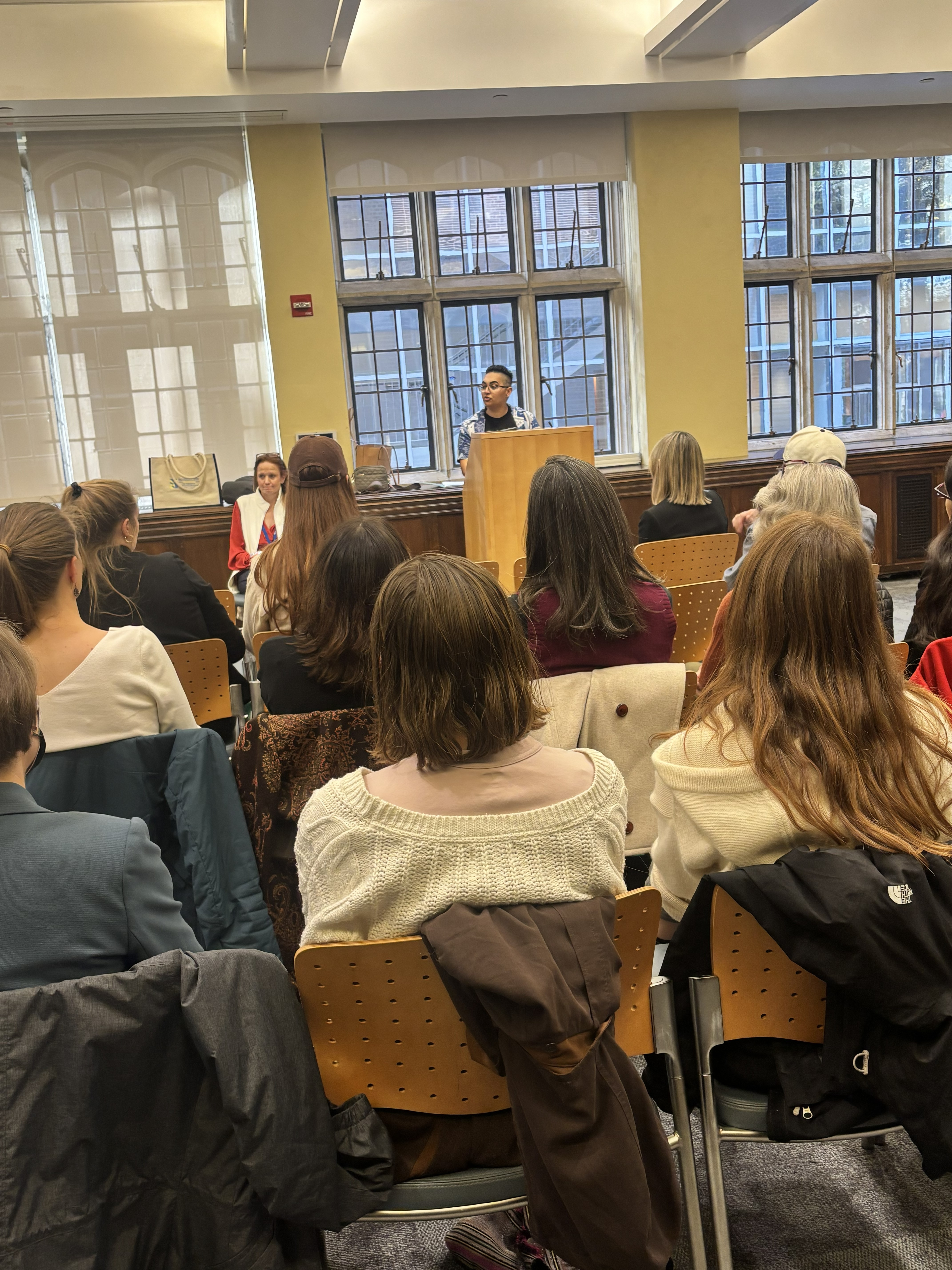 Keynote speaker with lived experience providing trauma-informed presentation